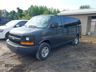 2014 Chevrolet Express Passenger LS with VIN 1GAWGPFG6E1173373, listed as a IAAI auction lot 42275513 with 26,642 mi miles and . Bid and sale history available at DreamBid. Image 2.