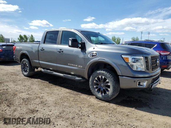 2016 Nissan Titan XD PRO-4X with VIN 1N6BA1F47GN504254, listed as a Copart auction lot 56670974 with 173,312 mi miles and Clean Title. Bid and sale history available at carsss.com. Image 4.
