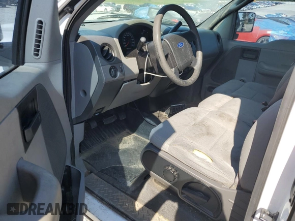 2005 Ford F-150 XL with VIN 1FTRF12255NB10143, listed as a Copart auction lot 67750754 with 250,615 mi miles and Salvage Title. Bid and sale history available at carsss.com. Image 8.