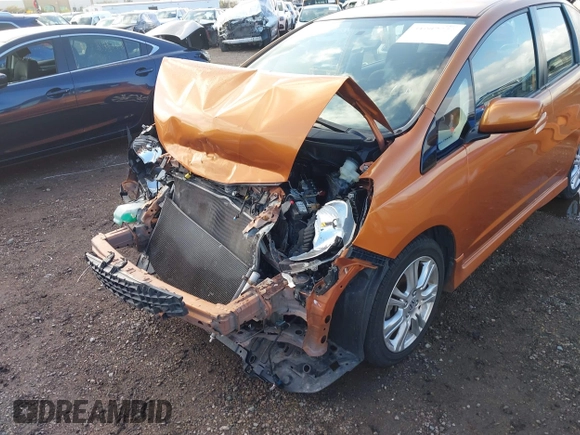 2011 Honda Fit Sport with VIN JHMGE8H57BS006558, listed as a IAAI auction lot 41907022 with 73,328 mi miles and . Bid and sale history available at DreamBid. Image 6.