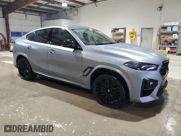 2024 BMW X6 M with VIN 5YM23ET0XR9U26576, listed as a Copart auction lot 86698164 with 6,669 mi miles and Salvage Title. Bid and sale history available at carsss.com. Image 4.