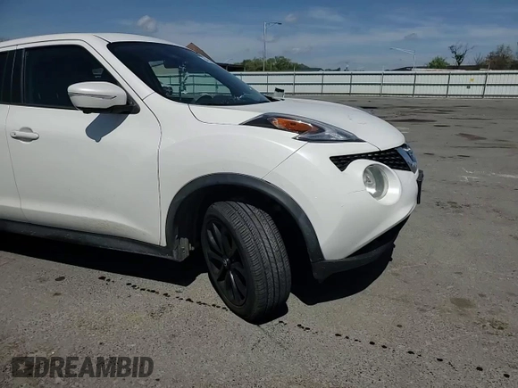 2015 Nissan Juke S with VIN JN8AF5MV5FT555169, listed as a Copart auction lot 54141895 with 122,962 mi miles and Salvage Title. Bid and sale history available at DreamBid. Image 14.
