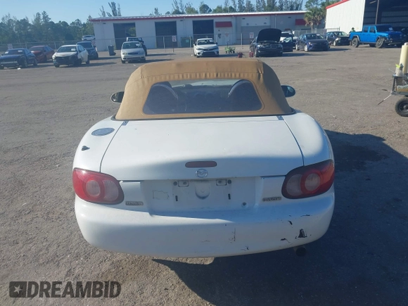 2003 Mazda MX-5 Miata Cloth z VIN JM1NB353730312566, wystawiony jako IAAI lot #41782864 z przebiegiem Nie podano mil oraz . Historia ofert i sprzedaży dostępna na DreamBid. Obrazek 16.