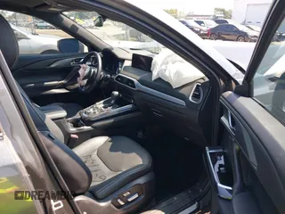 2022 Mazda CX-9 Grand Touring with VIN JM3TCBDY4N0618680, listed as a IAAI auction lot 40086806 with 34,142 mi miles and . Bid and sale history available at DreamBid. Image 5.