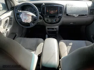 2001 Mazda Tribute LX with VIN 4F2YU09151KM38909, listed as a Copart auction lot 77808264 with 136,005 mi miles and Salvage Title. Bid and sale history available at carsss.com. Image 8.
