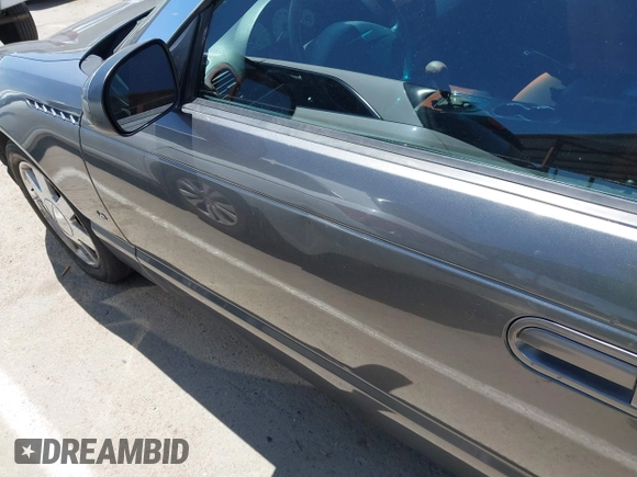 2003 Ford Thunderbird Deluxe z VIN 1FAHP60AX3Y109880, wystawiony jako IAAI lot #42336922 z przebiegiem 213 477 mil mil oraz . Historia ofert i sprzedaży dostępna na DreamBid. Obrazek 20.