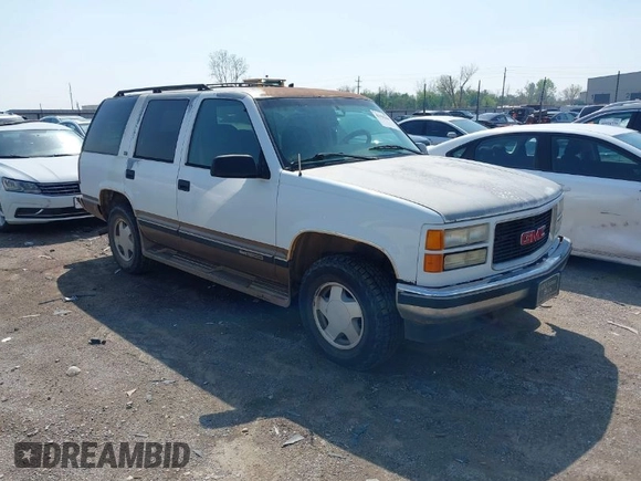 1996 GMC Yukon with VIN 1GKEK13R2TJ746811, listed as a IAAI auction lot 41955840 with 2,242,108 mi miles. Bid and sale history available at carsss.com. Image 1.
