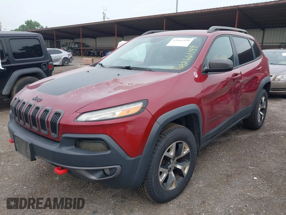 2015 Jeep Cherokee Trailhawk with VIN 1C4PJMBS6FW575517, listed as a IAAI auction lot 42661199 with 299,166 mi miles and . Bid and sale history available at DreamBid. Image 17.