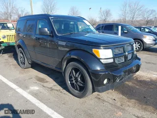 2007 Dodge Nitro R/T with VIN 1D8GU58687W702584, listed as a IAAI auction lot 41638743 with 123,018 mi miles. Bid and sale history available at carsss.com. Image 1.
