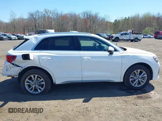 2021 Audi Q3 S line Premium z VIN WA1DECF32M1054786, wystawiony jako IAAI lot #42065278 z przebiegiem 47 615 mil mil oraz . Historia ofert i sprzedaży dostępna na DreamBid. Obrazek 13.