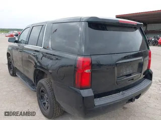 2019 Chevrolet Tahoe Commercial with VIN 1GNLCDECXKR231072, listed as a IAAI auction lot 41800007 with 100,101 mi miles. Bid and sale history available at carsss.com. Image 3.