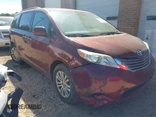 2015 Toyota Sienna XLE with VIN 5TDYK3DC3FS666438, listed as a IAAI auction lot 42117980 with 121,084 mi miles and . Bid and sale history available at DreamBid. Image 1.