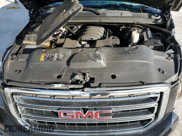 2019 GMC Yukon SLE with VIN 1GKS1AKC6KR302642, listed as a Copart auction lot 41510715 with 97,906 mi miles and Salvage Title. Bid and sale history available at carsss.com. Image 13.