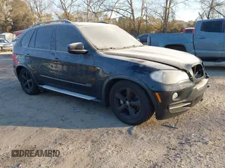 2007 BMW X5 3.0si with VIN 4USFE43557LY77127, listed as a IAAI auction lot 41394904 with 148,779 mi miles. Bid and sale history available at carsss.com. Image 1.