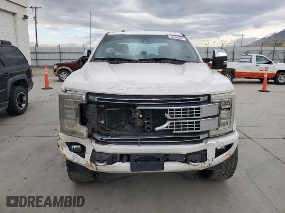 2017 Ford F-250 Lariat with VIN 1FT7W2BT6HED83358, listed as a Copart auction lot 55566865 with 140,578 mi miles and Salvage title. Bid and sale history available at DreamBid. Image 5.