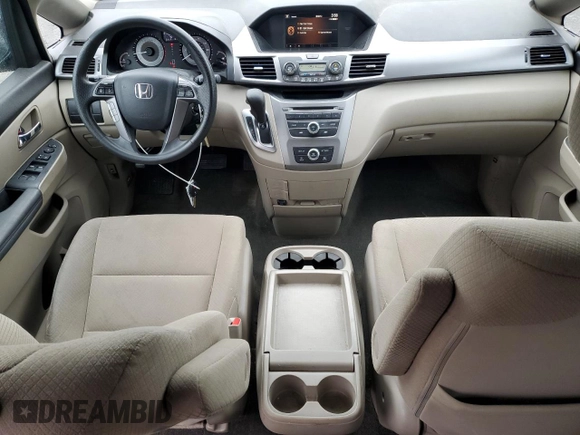 2014 Honda Odyssey LX z VIN 5FNRL5H24EB098072, wystawiony jako Copart lot #57577385 z przebiegiem 215 069 mil mil oraz Szkoda całkowita • Salvage title. Historia ofert i sprzedaży dostępna na DreamBid. Obrazek 8.