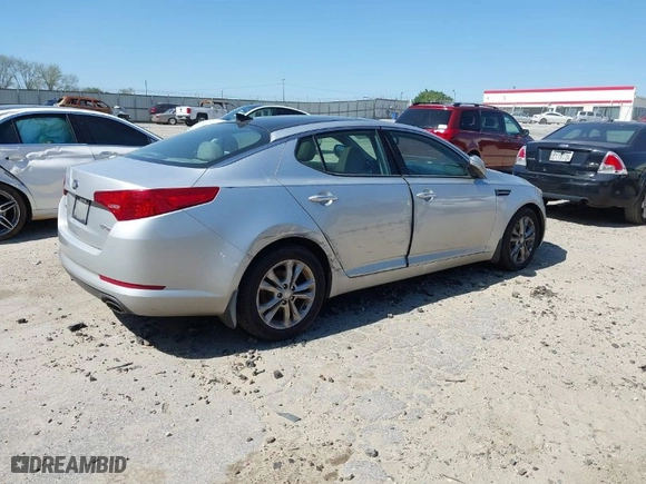 2013 Kia Optima EX with VIN 5XXGN4A72DG163692, listed as a IAAI auction lot 42051382 with 273,301 mi miles. Bid and sale history available at carsss.com. Image 4.