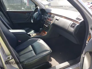 2002 Mercedes-Benz E-Class with VIN WDBJF82J02X070968, listed as a IAAI auction lot 41352216 with 91,704 mi miles. Bid and sale history available at carsss.com. Image 5.