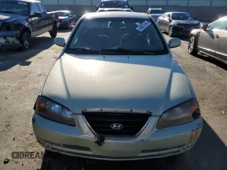 2004 Hyundai Elantra GLS z VIN KMHDN46D64U919337, wystawiony jako Copart lot #54627945 z przebiegiem 184 087 mil mil oraz Szkody całkowita. Historia ofert i sprzedaży dostępna na DreamBid. Obrazek 5.