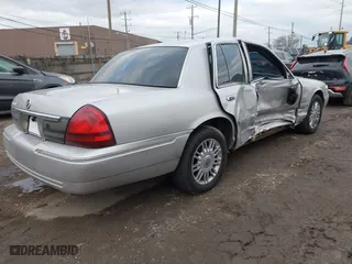 2010 Mercury Grand Marquis LS with VIN 2MEBM7FV1AX612153, listed as a IAAI auction lot 40979537 with 120,359 mi miles. Bid and sale history available at carsss.com. Image 4.