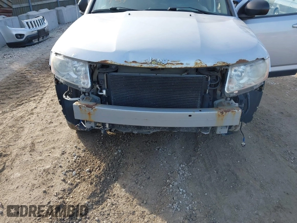 2012 Jeep Compass Sport with VIN 1C4NJCBA9CD716418, listed as a IAAI auction lot 41537458 with 111,532 mi miles. Bid and sale history available at carsss.com. Image 6.