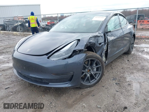 2022 Tesla Model 3 Long Range with VIN 5YJ3E1EB8NF201023, listed as a IAAI auction lot 41942943 with 30,635 mi miles and . Bid and sale history available at DreamBid. Image 16.