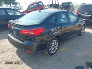 2015 Ford Focus SE z VIN 1FADP3F25FL284097, wystawiony jako IAAI lot #42553323 z przebiegiem 139 647 mil mil oraz . Historia ofert i sprzedaży dostępna na DreamBid. Obrazek 4.