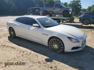 2017 Maserati Quattroporte z VIN ZAM56RRL1H1230279, wystawiony jako Copart lot #67067924 z przebiegiem Nie podano mil oraz Czysty tytuł • Clean title. Historia ofert i sprzedaży dostępna na DreamBid. Obrazek 4.