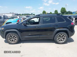 2020 Jeep Cherokee Latitude z VIN 1C4PJMCX3LD584466, wystawiony jako IAAI lot #42380627 z przebiegiem 53 062 mil mil oraz . Historia ofert i sprzedaży dostępna na DreamBid. Obrazek 14.