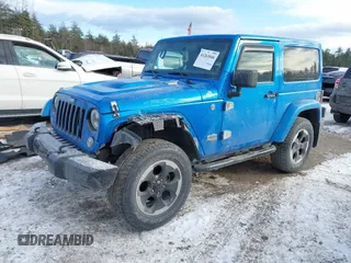 2014 Jeep Wrangler Sahara with VIN 1C4AJWBG0EL218217, listed as a IAAI auction lot 41263046 with 79,137 mi miles and . Bid and sale history available at DreamBid. Image 2.
