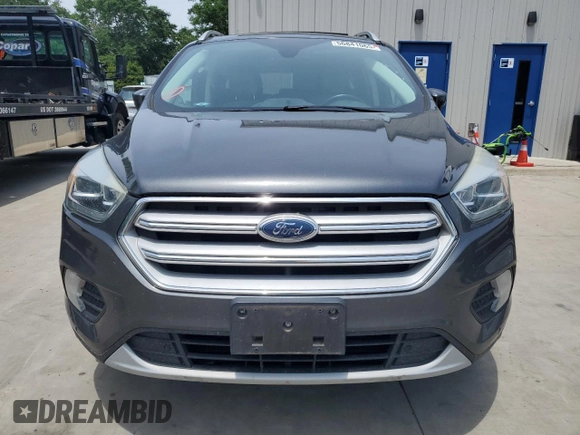 2018 Ford Escape Titanium with VIN 1FMCU0J93JUB20136, listed as a Copart auction lot 56841065 with 129,954 mi miles and Salvage title. Bid and sale history available at DreamBid. Image 5.