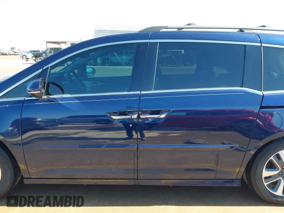 2016 Honda Odyssey Touring Elite with VIN 5FNRL5H98GB083221, listed as a IAAI auction lot 41626604 with 145,341 mi miles and . Bid and sale history available at DreamBid. Image 15.