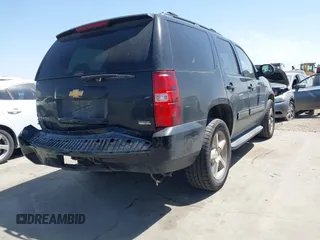 2012 Chevrolet Tahoe LT with VIN 1GNSCBE07CR229240, listed as a IAAI auction lot 41837063 with 219,901 mi miles and . Bid and sale history available at DreamBid. Image 4.
