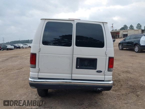 2003 Ford Econoline Passenger XL with VIN 1FBNE31L63HA12648, listed as a IAAI auction lot 41763111 with 592,494 mi miles and . Bid and sale history available at carsss.com. Image 17.