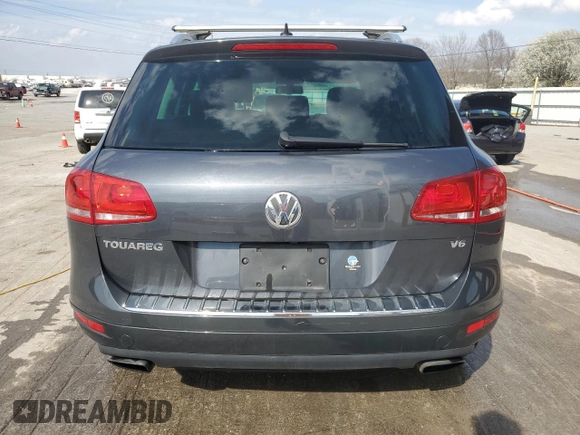 2011 Volkswagen Touareg Sport with VIN WVGFF9BPXBD005821, listed as a Copart auction lot 49391505 with 111,938 mi miles and Salvage Title. Bid and sale history available at DreamBid. Image 6.
