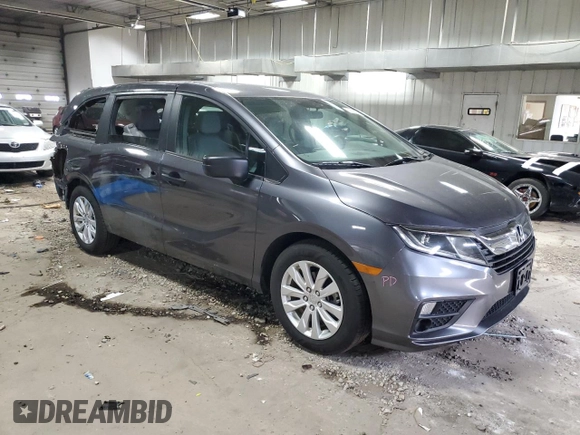 2019 Honda Odyssey LX with VIN 5FNRL6H24KB101473, listed as a Copart auction lot 51894325 with 66,285 mi miles and Salvage Title. Bid and sale history available at DreamBid. Image 4.