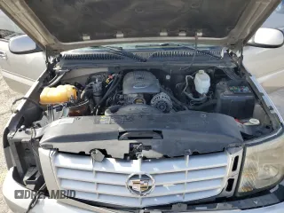 2004 Cadillac Escalade z VIN 1GYEC63T44R235759, wystawiony jako Copart lot #53166755 z przebiegiem 212 034 mil mil oraz Szkody całkowita. Historia ofert i sprzedaży dostępna na DreamBid. Obrazek 12.