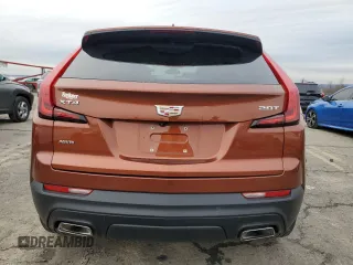 2019 Cadillac XT4 AWD Luxury with VIN 1GYFZBR42KF157525, listed as a Copart auction lot 85779424 with 19,982 mi miles and Salvage Title. Bid and sale history available at carsss.com. Image 6.