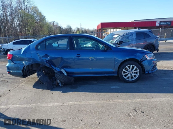 2015 Volkswagen Jetta SE z VIN 3VWD07AJ4FM285676, wystawiony jako IAAI lot #41787061 z przebiegiem 142 537 mil mil oraz . Historia ofert i sprzedaży dostępna na DreamBid. Obrazek 12.