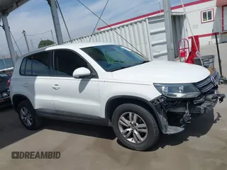 2014 Volkswagen Tiguan SEL with VIN WVGAV3AX0EW524669, listed as a IAAI auction lot 42289003 with 94,513 mi miles and . Bid and sale history available at DreamBid. Image 14.