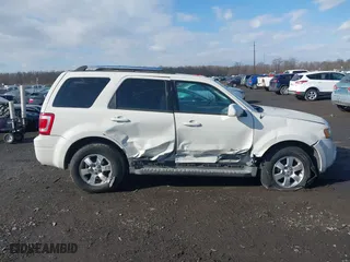 2009 Ford Escape Hybrid with VIN 1FMCU49319KC11629, listed as a IAAI auction lot 41426705 with 191,135 mi miles. Bid and sale history available at carsss.com. Image 13.