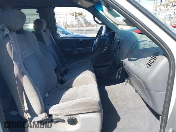 2002 Ford F-150 XL with VIN 1FTRX17L82NA54581, listed as a IAAI auction lot 41698662 with 220,321 mi miles. Bid and sale history available at carsss.com. Image 5.