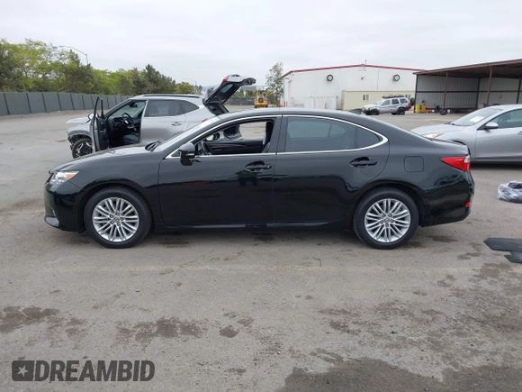 2015 Lexus ES 330 with VIN JTHBK1GG1F2156202, listed as a IAAI auction lot 42174703 with 119,758 mi miles and . Bid and sale history available at DreamBid. Image 14.