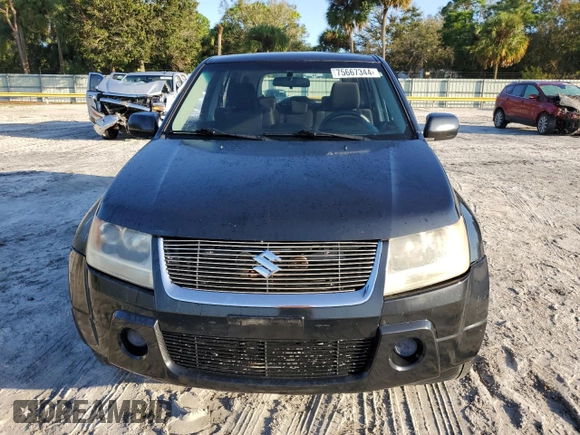 2007 Suzuki Grand Vitara z VIN JS3TE941674200553, wystawiony jako Copart lot #75667344 z przebiegiem 177 312 mil mil oraz Szkoda całkowita • Salvage title. Historia ofert i sprzedaży dostępna na DreamBid. Obrazek 5.