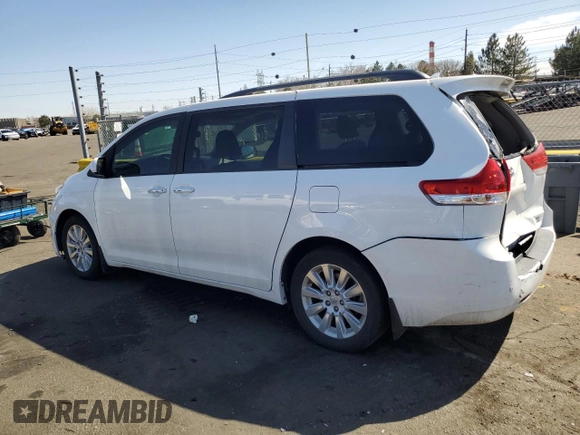 2014 Toyota Sienna Ltd with VIN 5TDDK3DCXES090201, listed as a Copart auction lot 43001075 with 183,788 mi miles and Salvage Title. Bid and sale history available at carsss.com. Image 2.
