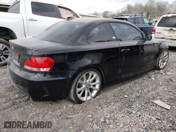 2013 BMW 1 Series 135i with VIN WBAUC9C55DVM13414, listed as a Copart auction lot 48747914 with 106,214 mi miles and Salvage title. Bid and sale history available at DreamBid. Image 3.
