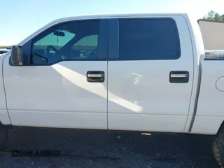 2014 Ford F-150 XL with VIN 1FTFW1EF9EFB42928, listed as a IAAI auction lot 41588979 with 154,192 mi miles. Bid and sale history available at carsss.com. Image 13.