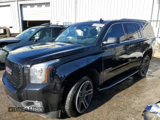 2017 GMC Yukon SLT with VIN 1GKS1BKC3HR174293, listed as a Copart auction lot 86320344 with 147,873 mi miles and Salvage Title. Bid and sale history available at carsss.com. Image 1.