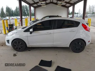 2013 Ford Fiesta S with VIN 3FADP4TJ4DM226897, listed as a IAAI auction lot 41916651 with 56,714 mi miles and . Bid and sale history available at DreamBid. Image 13.