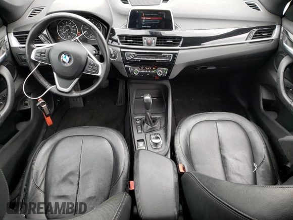 2018 BMW X1 xDrive28i with VIN WBXHT3C33J5K23187, listed as a Copart auction lot 71063192 with 97,403 mi miles. Bid and sale history available at carsss.com. Image 8.